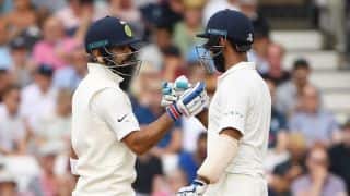 Lunch report: Kohli, Pujara take India forward after Broad nails two